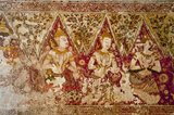Wat Yai Suwannaram dates from the 17th century Ayutthaya period. The murals display celestial beings.